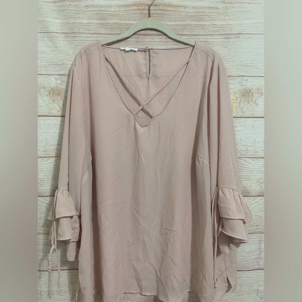 Maurice’s light pink blouse